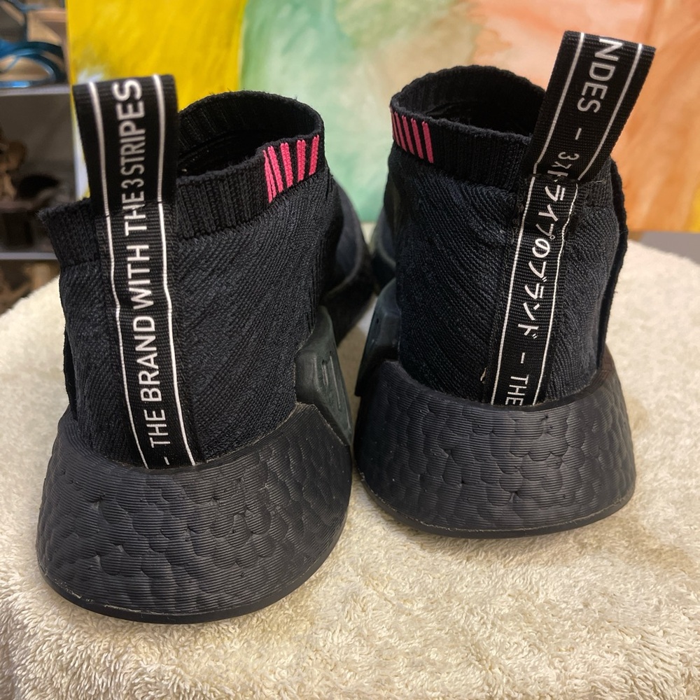 Adidas Black Athletic Shoes with highlights